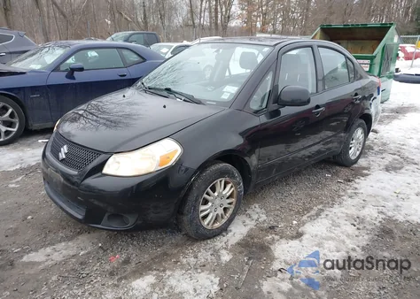 2012 Suzuki Sx4 Le/Le Popular z USA, uszkodzony, nr VIN JS2YC5A3XC6304511
